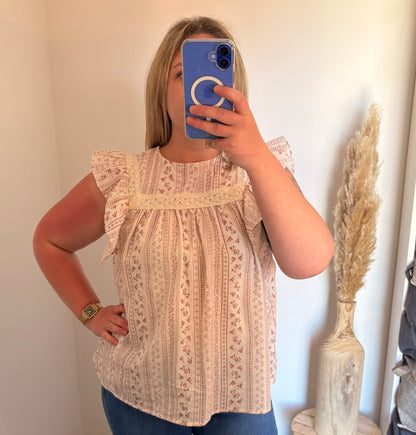 Blouse fluide à motifs et volants